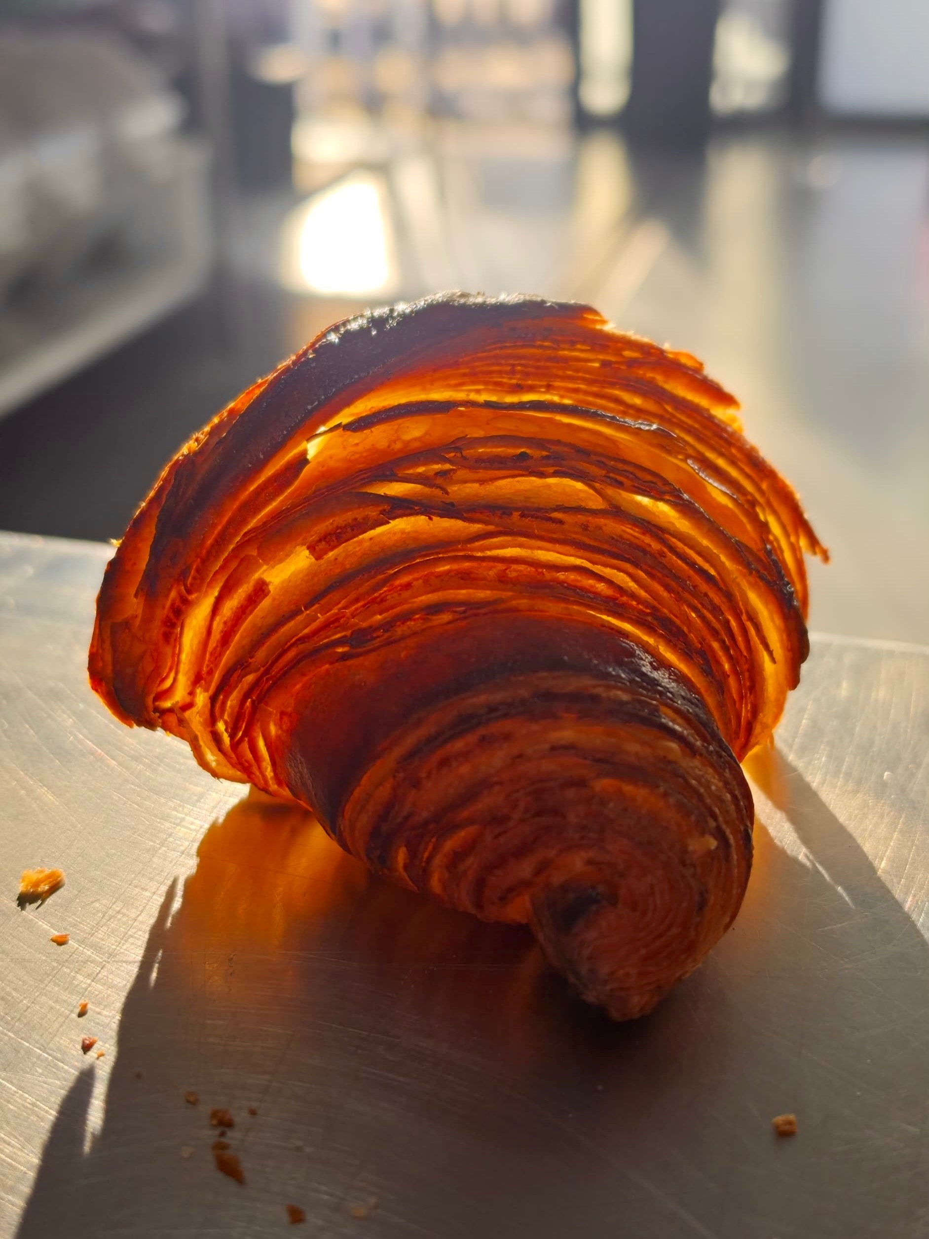 A croissant is flour, butter and time, folded into something almost weightless. 

Layer after layer, our homemade croissants are rolled, folded and rested, giving the butter time to settle between the folds and create that delicate, flaky texture.

F
