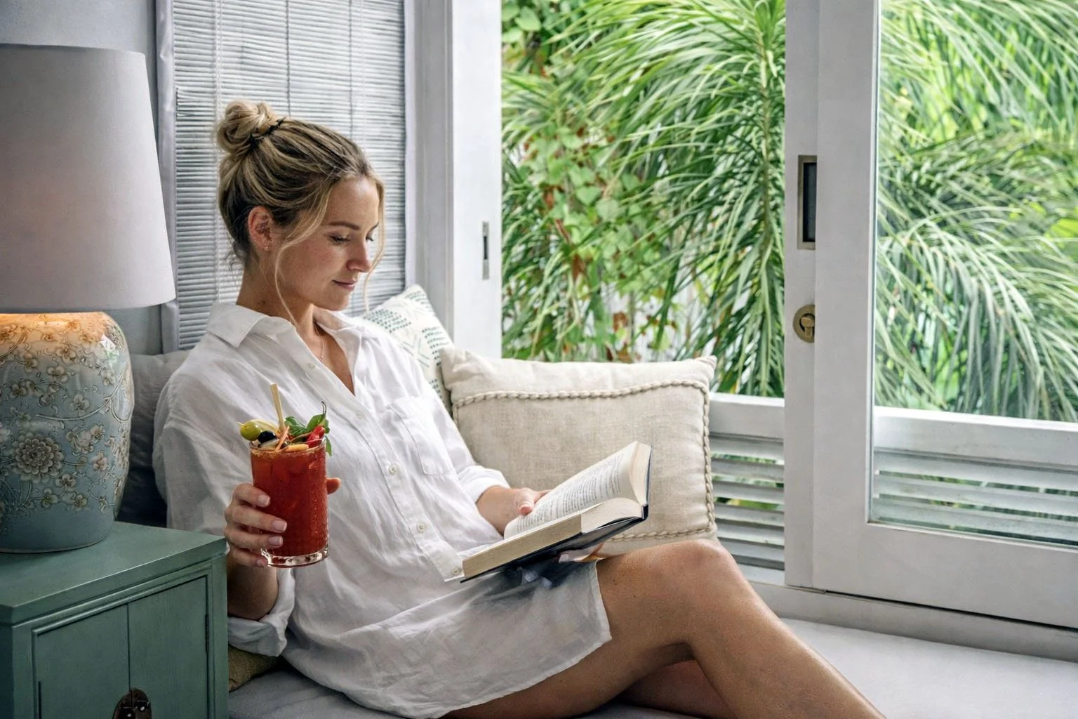 Relaxing with a cocktail and book opt.jpg