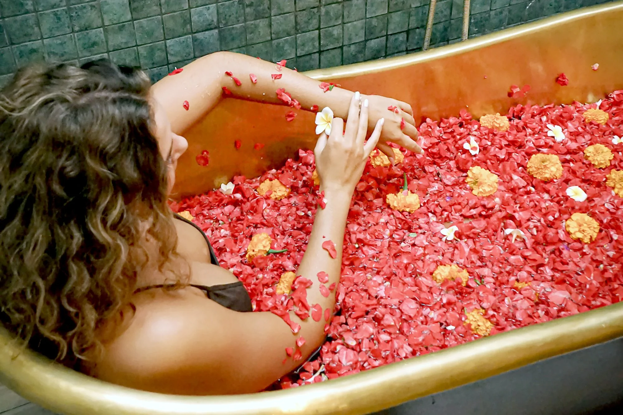 Woman in flower bath.jpg