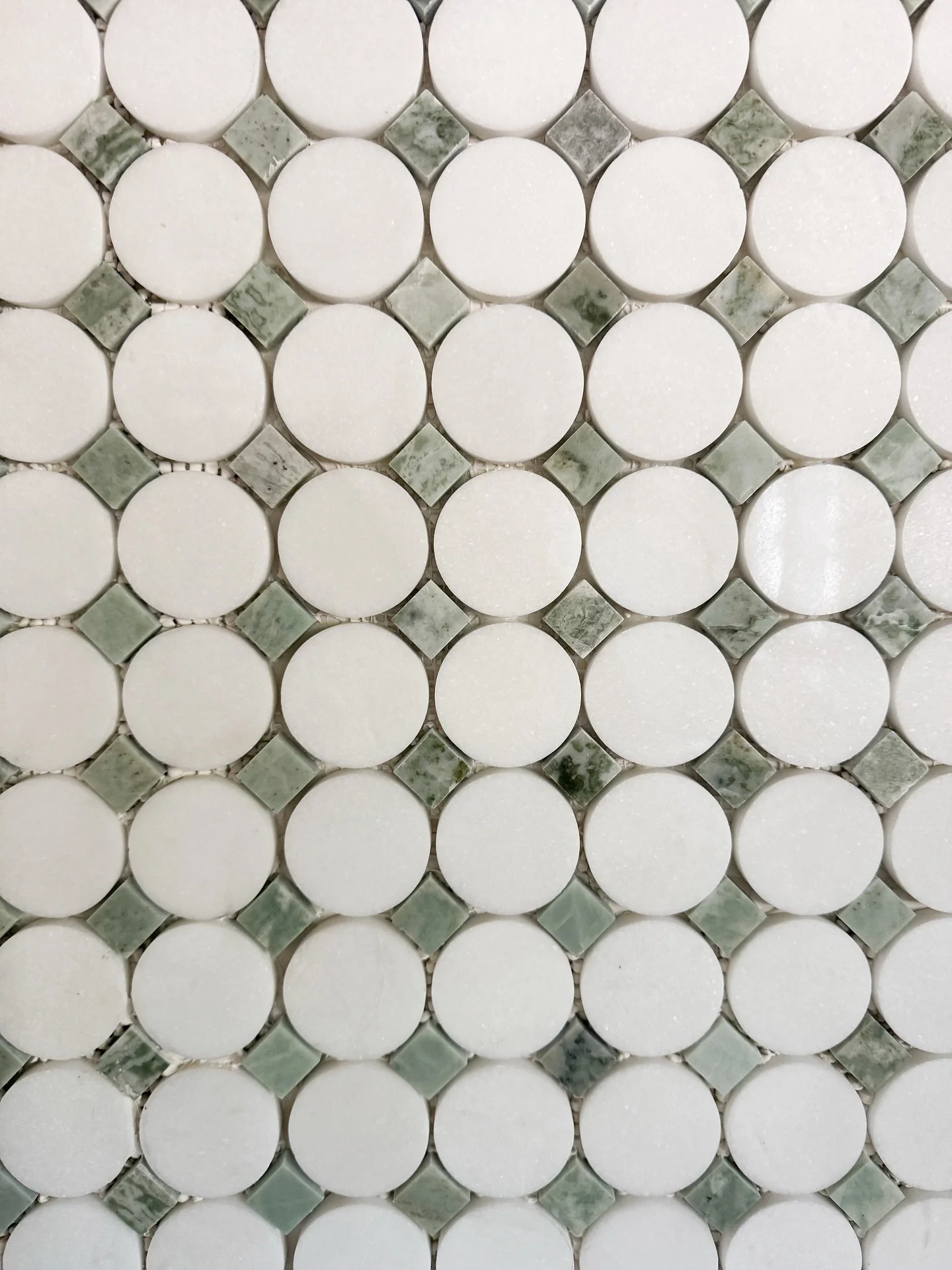 ✨ Tile pairing magic ✨ 

For the kitchen, I wanted each area to have its own quiet personality while still feeling connected. The mosaic by the range felt distinctly culinary, timeless and full of charm, while the moody green marble subway tile at th