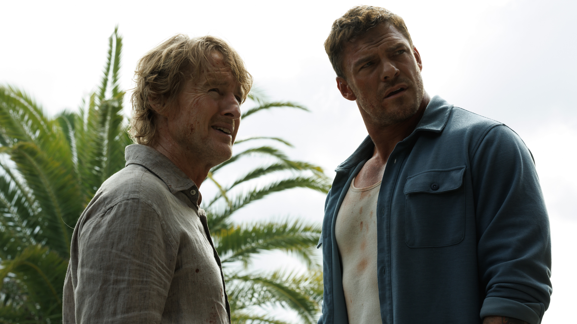Alan Ritchson and Owen Wilson race across Brisbane in the new movie, Runner.