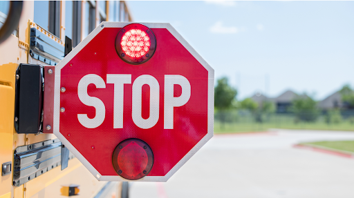 Stop sign on school bus for safety on Stop Arm Awareness Day