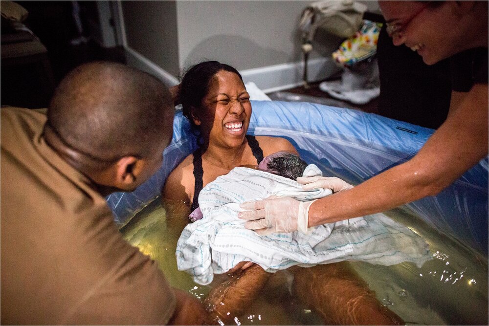 Pure joy as mom delivers fifth baby in water birth at home, home hypnobirth Photography Philadelphia