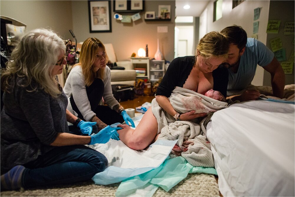 Birth team helps mom and dad deliver newborn at home, Philadelphia Birth Photographer
