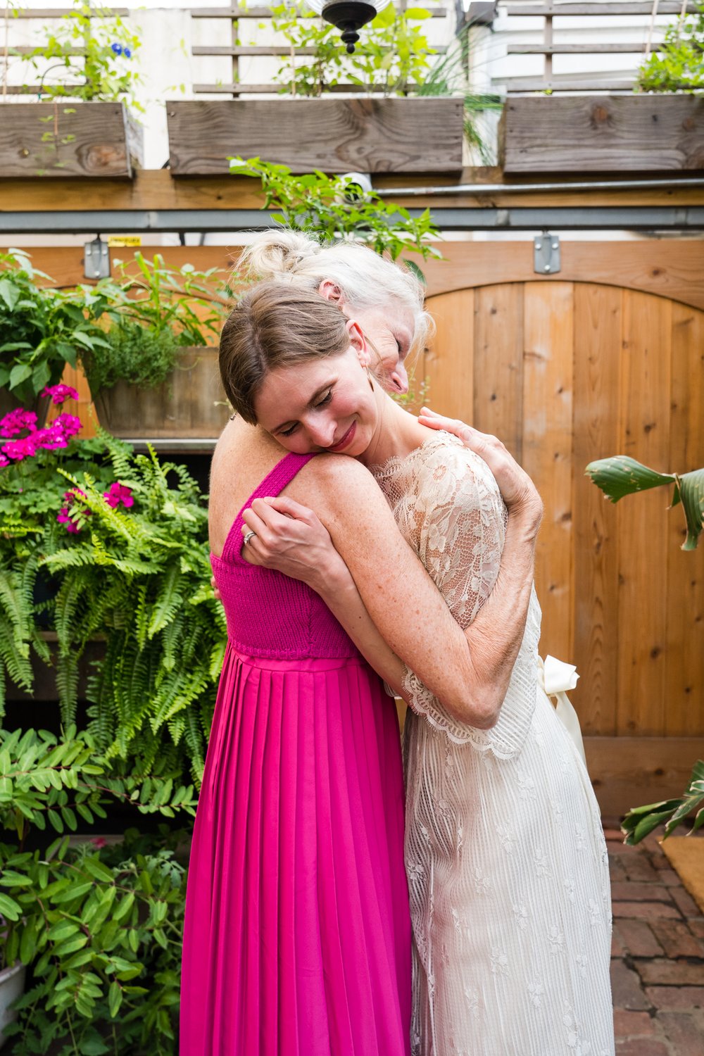 Bride and mom embrace, Philadelphia wedding photographer