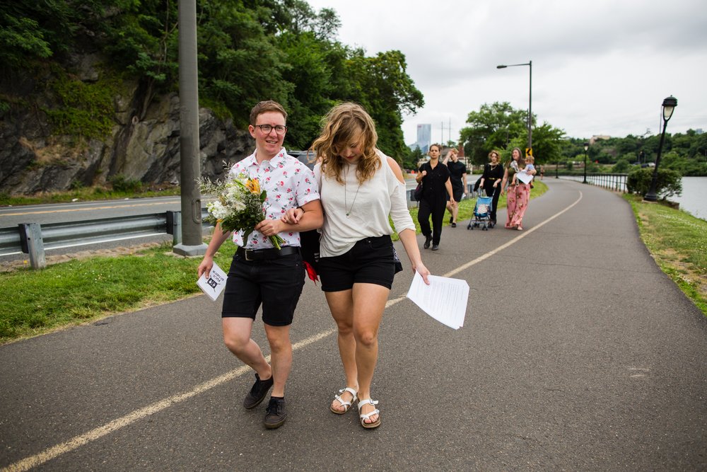 Couple walks down Parkway to elope next to Schuylkill River, Philadelphia photographer