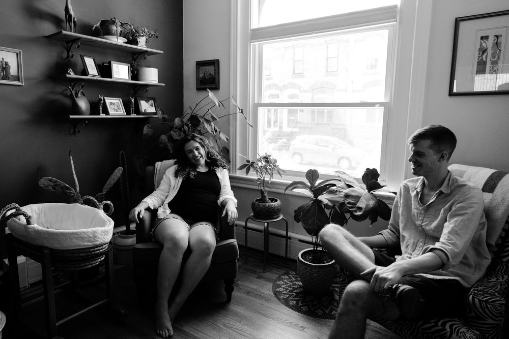 Couple lounges in their South Philly home, mom is pregnant, Philadelphia maternity photographer