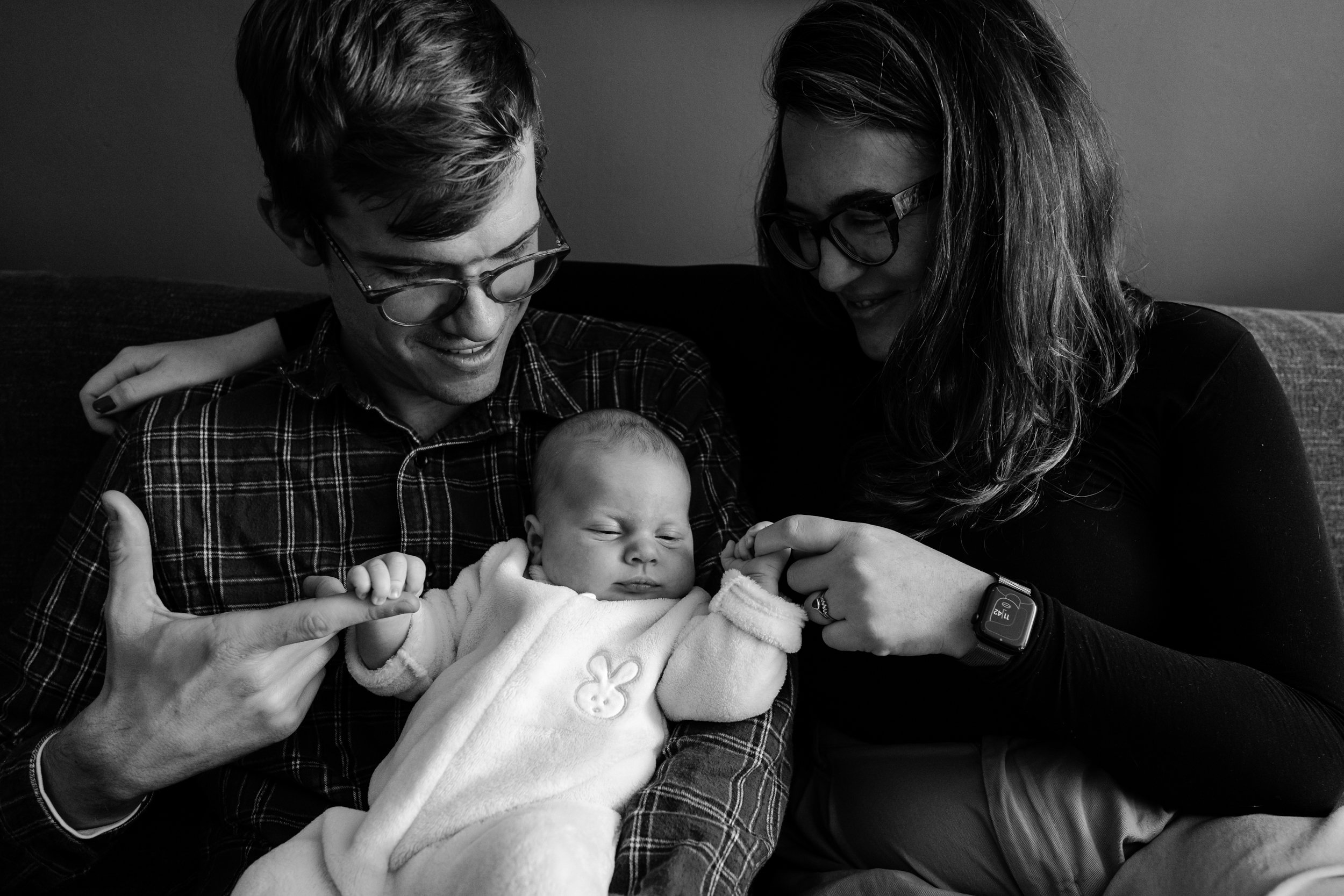Black and white portrait of mom, dad, and baby, Philly newborn photography