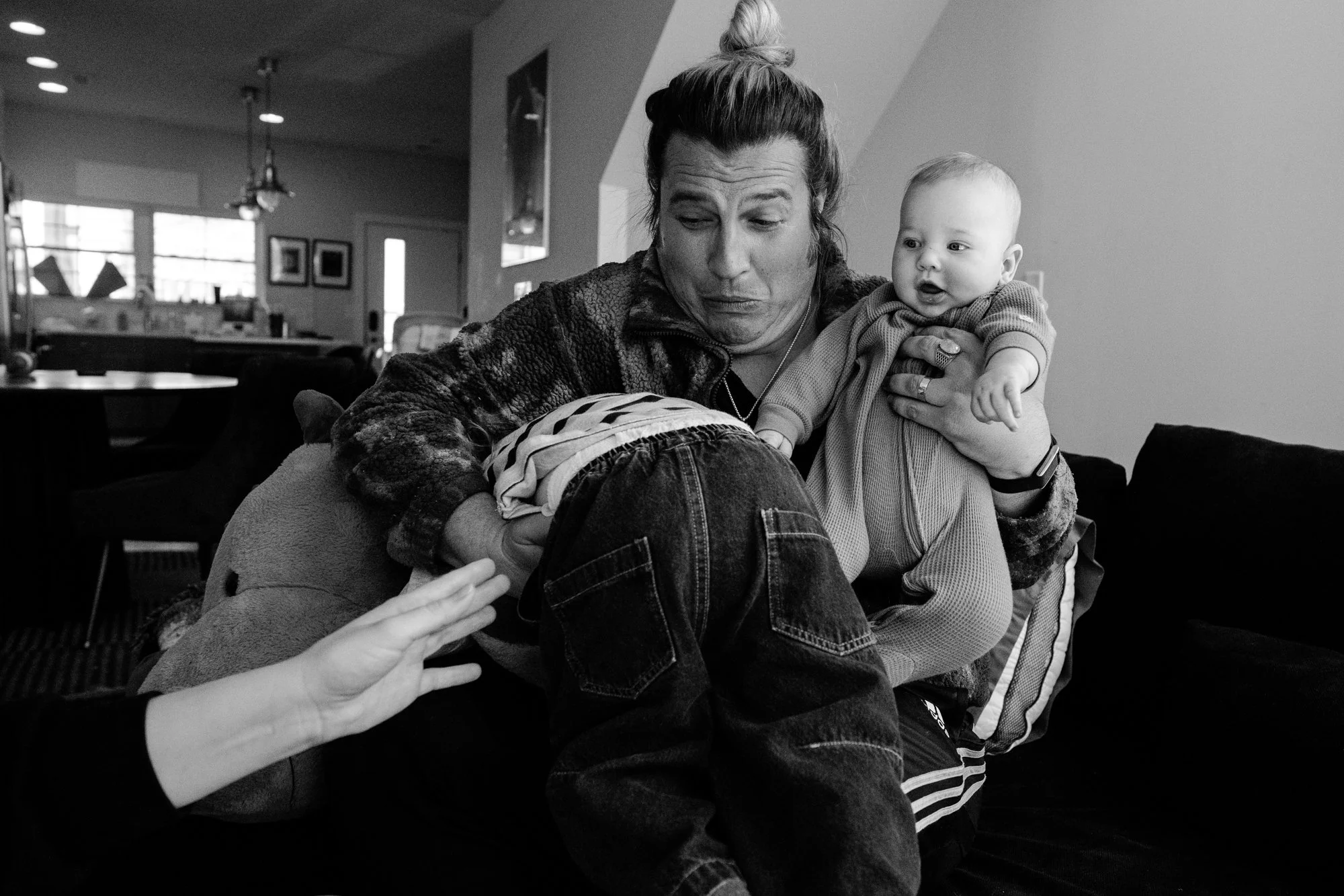 Some toddlers will sit still with their new baby sibling and smile nicely for photos... or so I've been told 😂
But who wants that anyway! Give me all of the rambunctious energy, all of the silly faces, all of the wrestling and jumping on furniture! 