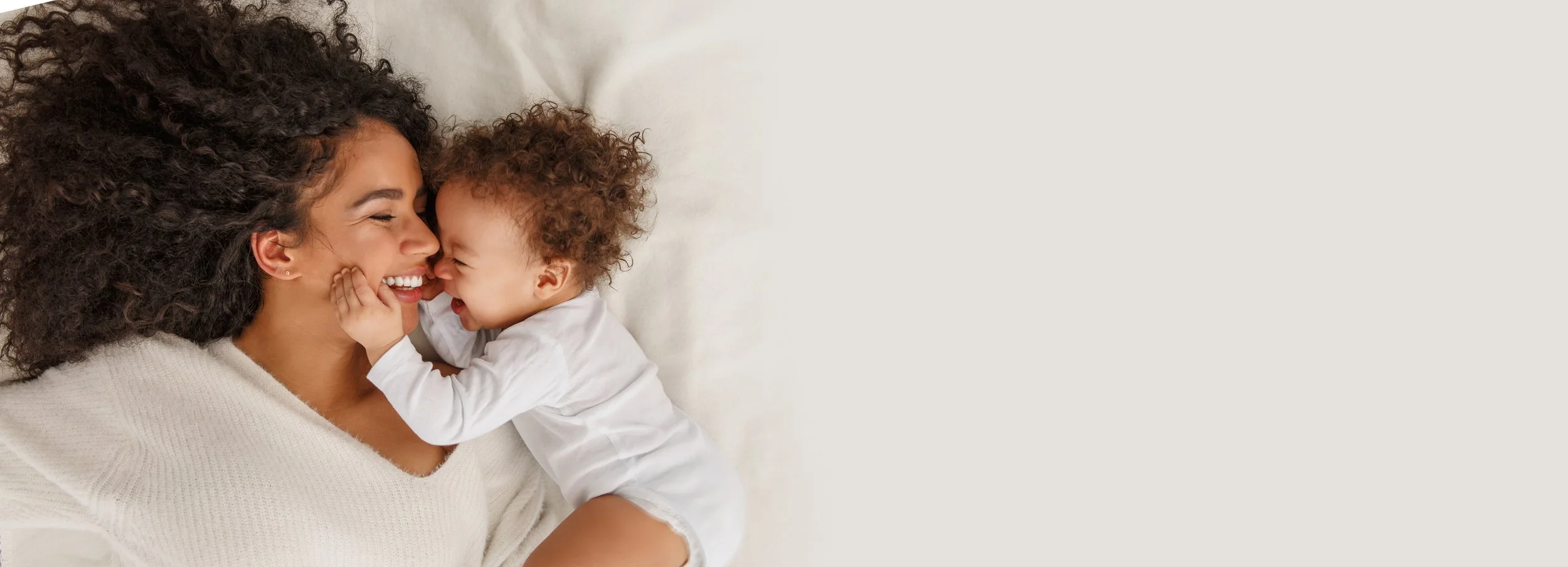 happy newborn and well rested mom