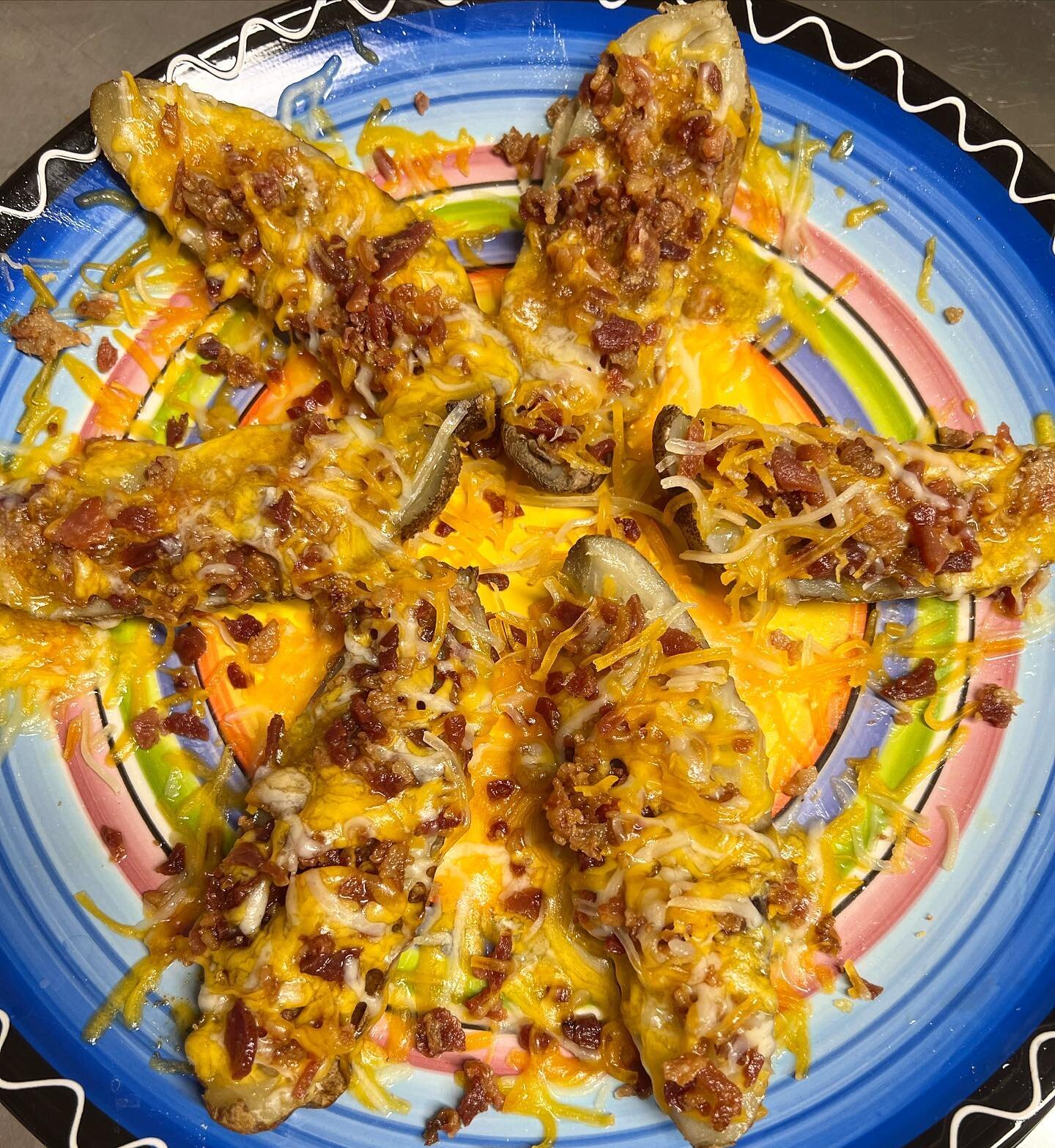 Loaded Potato Skins is a lunch favorite @theloungegvl !!! Usually served with bacon, cheese, sour cream, green onions, ranch, and BBQ sauce. Seasoned with @justrightseasoning - This customer asked for no sour cream, bbq sauce, or green onions!!! Come