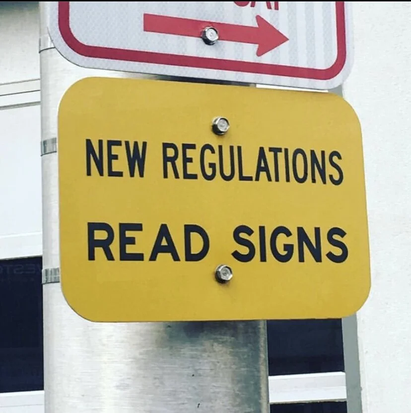 READ SIGNS The process of reading this New York City street sign is a performance of its instructions, and yet we realize that the information about the new regulations requires us to read other signs. But the spacing also allows for an interpretatio