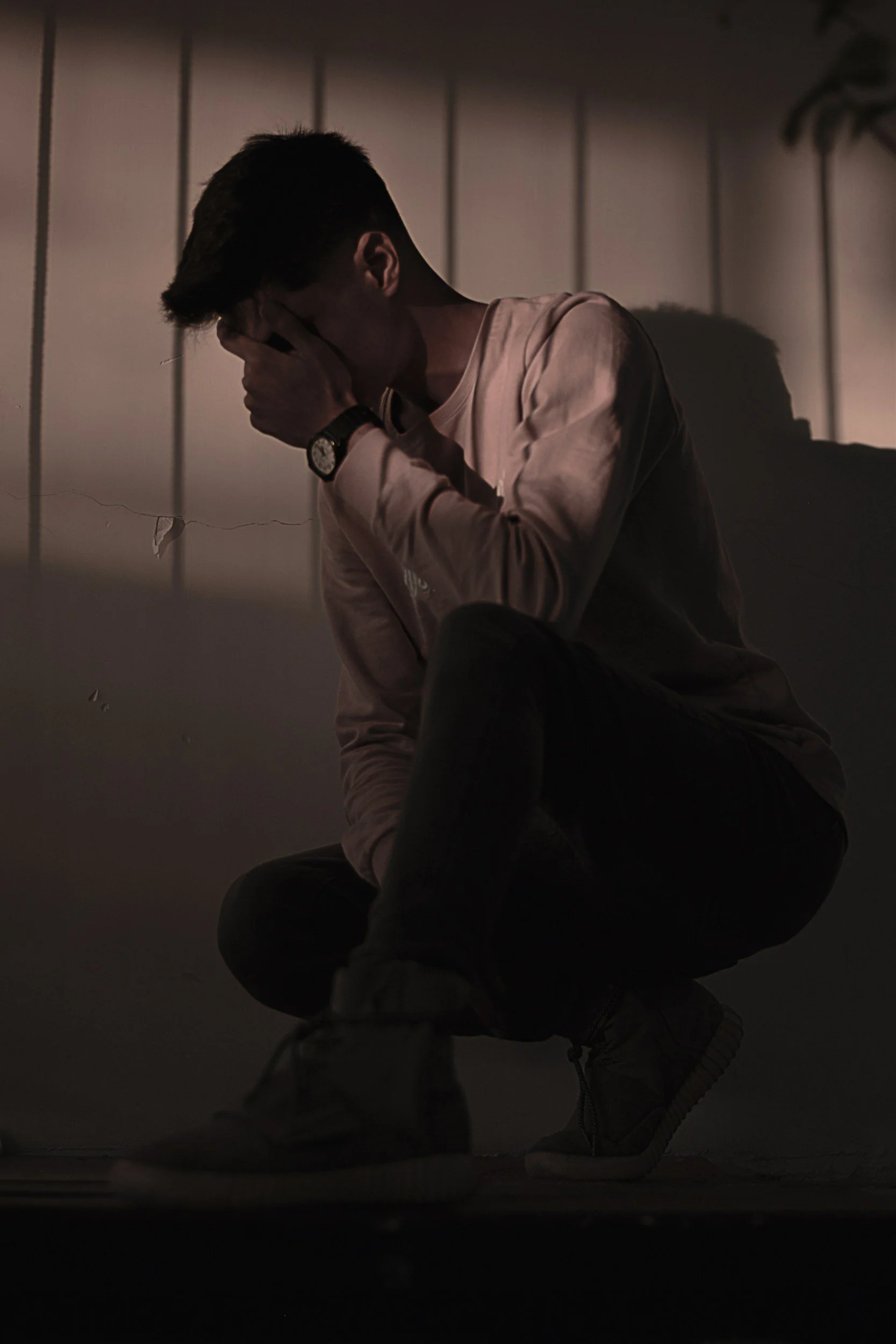 Photo of a man distressed representing emotional effects of trauma