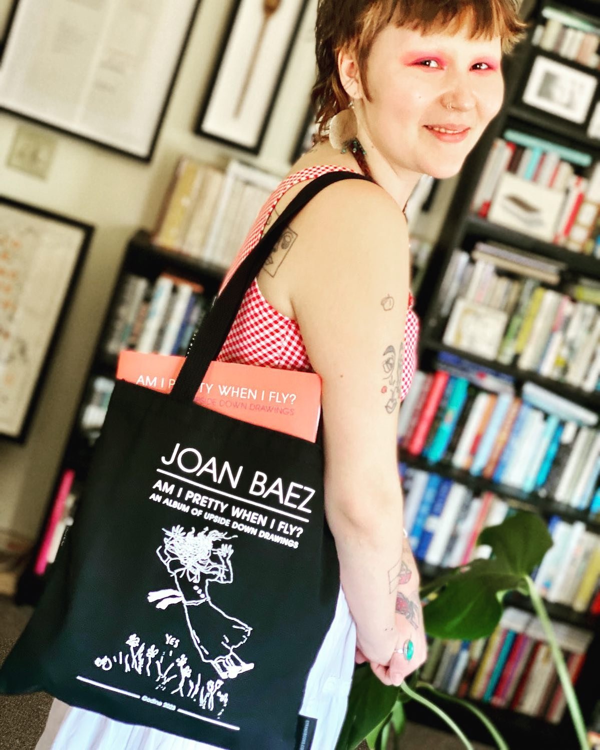 Wearing my production designer hat, I also get to do fun things like make Joan Baez AM I PRETTY WHEN I FLY? tote bags for the Strand Book Store. Modeled by the lovely Elona. Published by Godine.

#biddeford #biddefordmaine #joanbaez