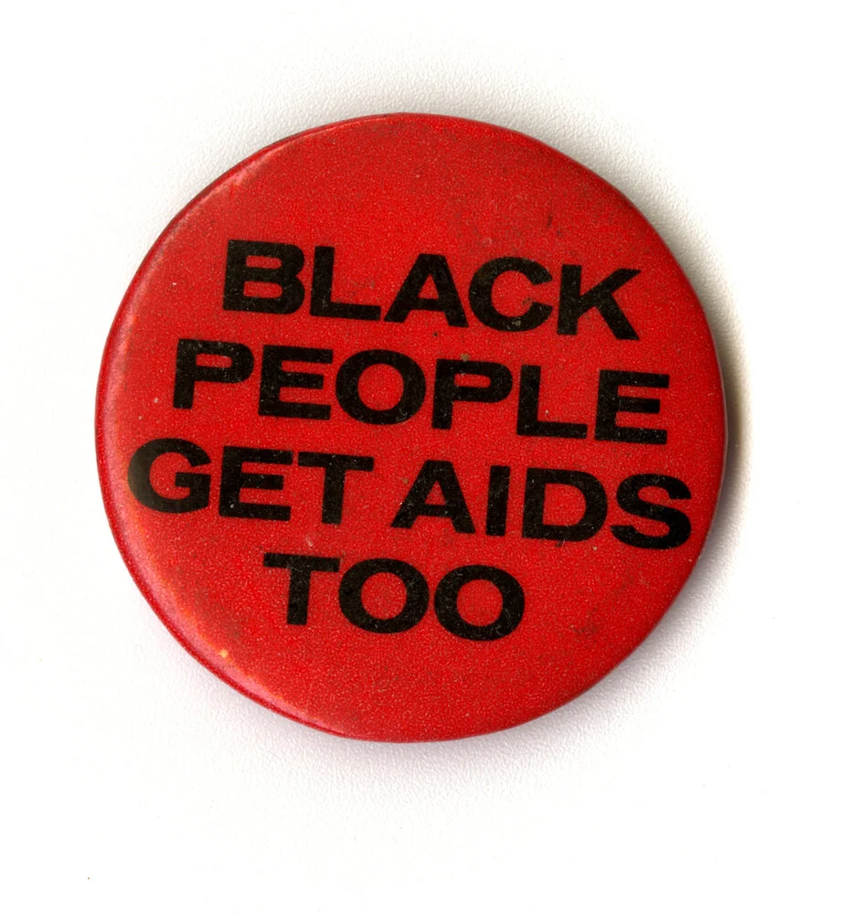 "Black People Get AIDS Too," year unknown. ONE Archives Button Collection, ONE Archives at the USC Libraries. 