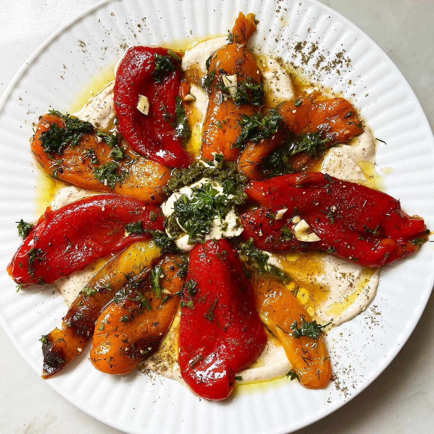 Roasted Peppers in Parsley &amp; Dill Vinaigrette 🌶🌿 I roasted 6 large colorful peppers at 425 for 30 min to the point where their skin browned and blistered. Removed from the oven and placed them in a dish with a lid so they sweat 😅 When they coo