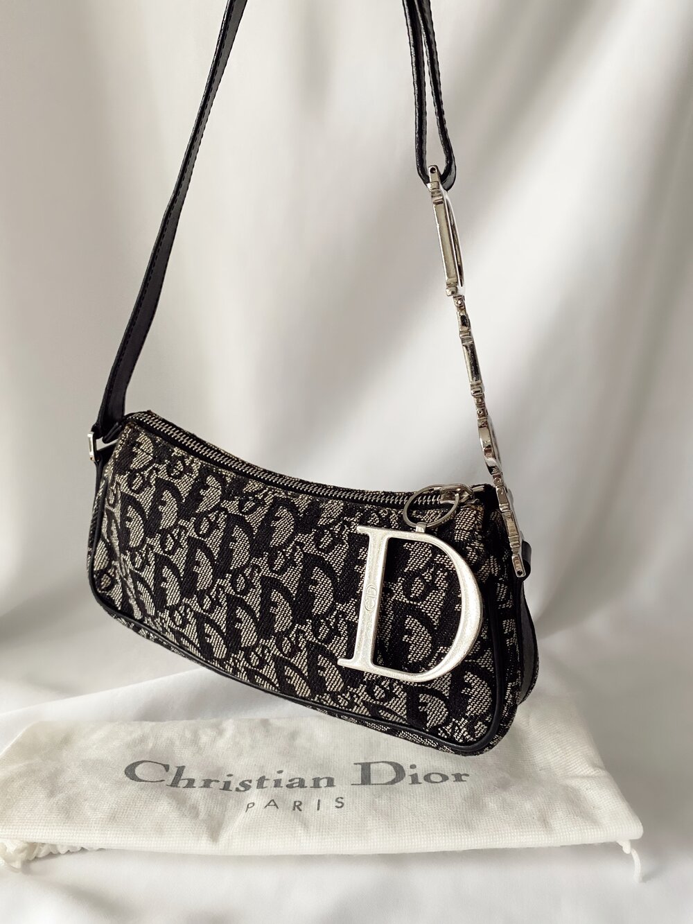 Christian Dior Black Nylon Leather Silver Charm Top Handle Pochette - –  Rustic Reloved