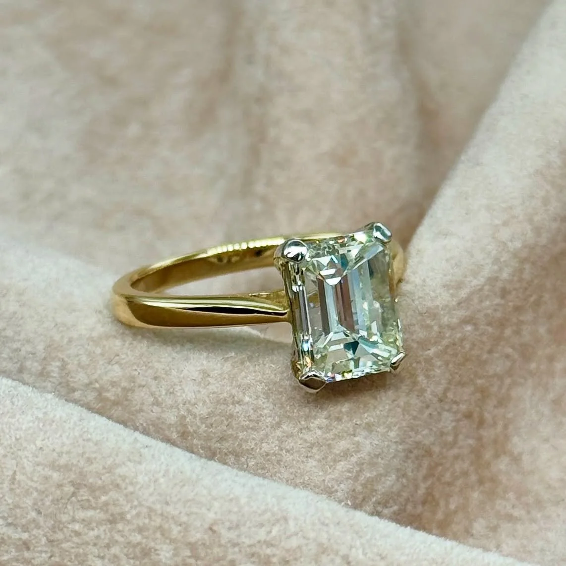 💎 Fresh from the bench and ready to dazzle 💎
This custom 2.5ct emerald-cut diamond is set in a timeless yellow gold solitaire with platinum prongs &mdash; elegance at its finest. The clean lines, crisp facets, and radiant sparkle make this piece a 