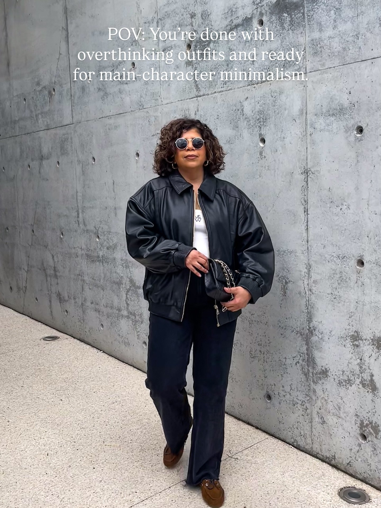 Minimal. Effortless. Elevated.

An oversized leather jacket instantly adds edge to a simple white tank and black denim combo &mdash; a timeless outfit formula that never fails. I balanced the structure of the jacket with relaxed tailoring and softene