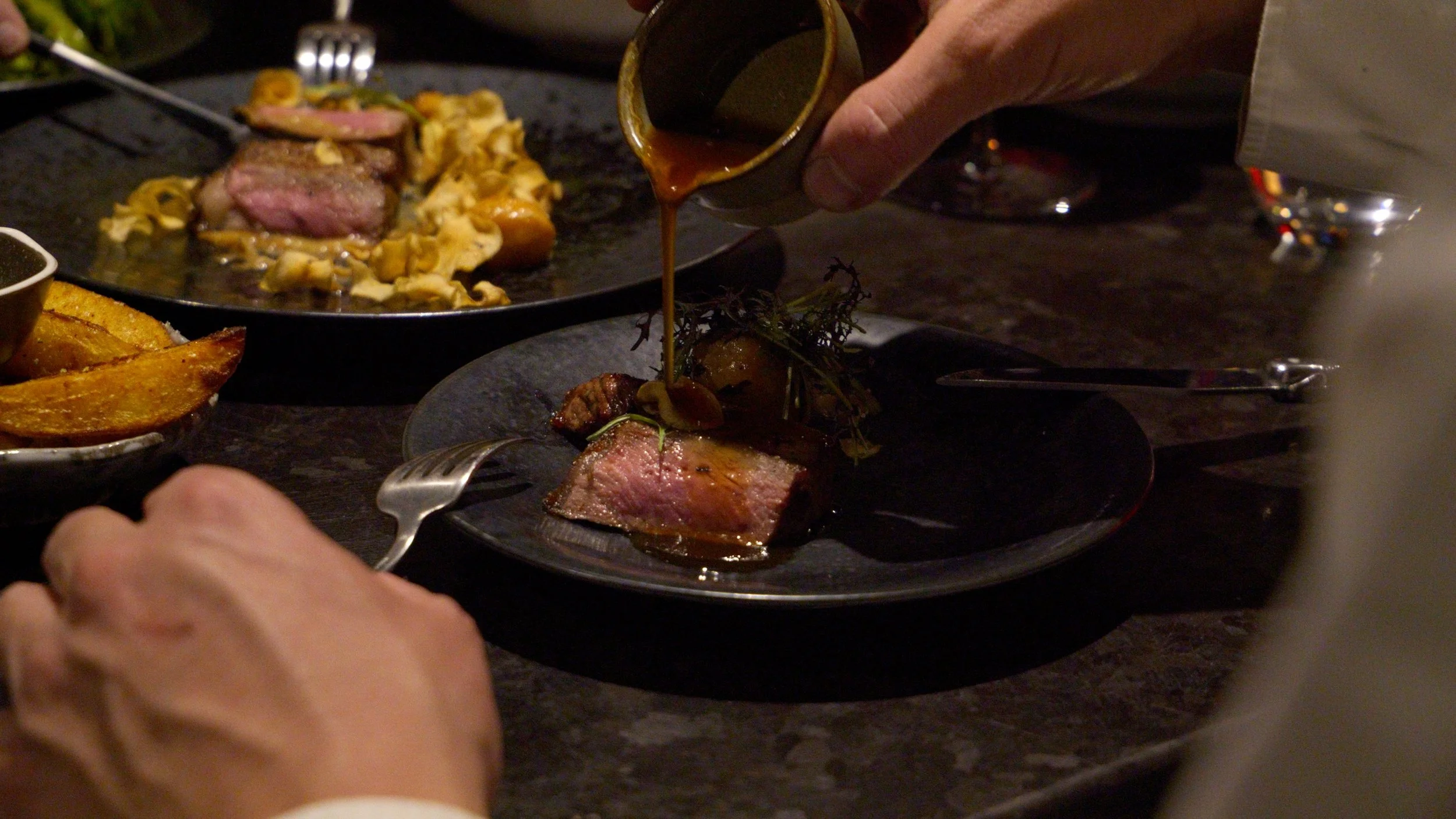 Astra - Sauce Pour onto Steak.jpg