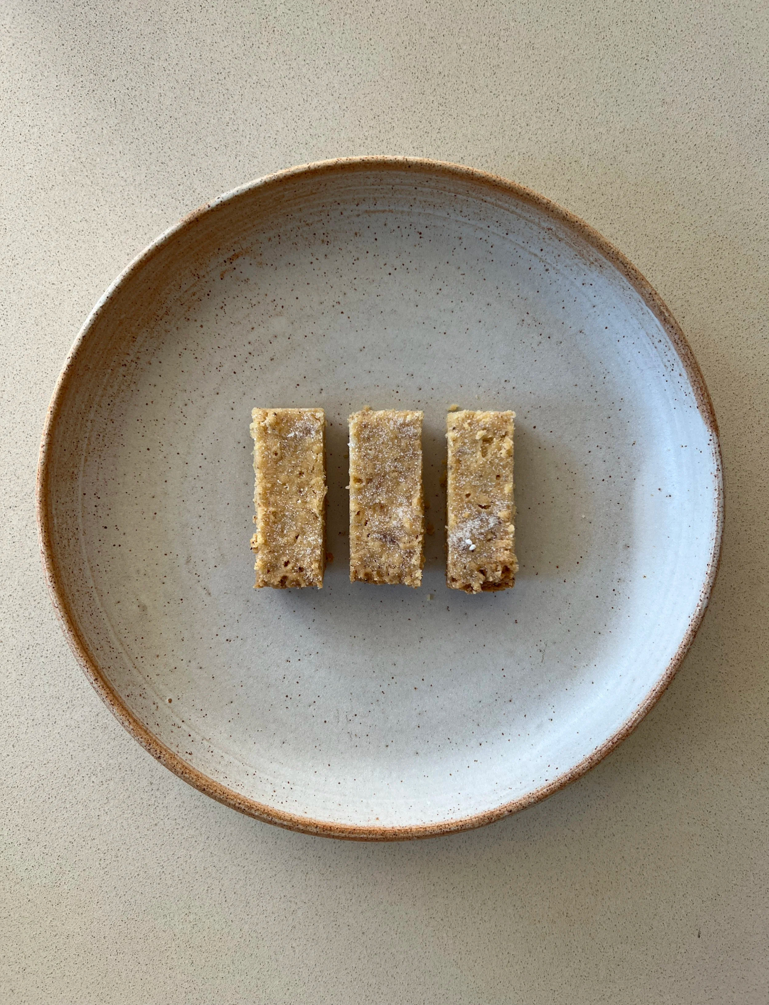 brown butter shortbread freshly baked on a stone plate