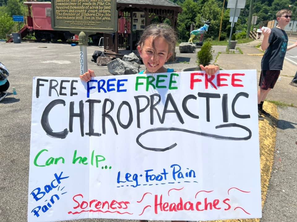 Chiro sign with Lydia.jpg