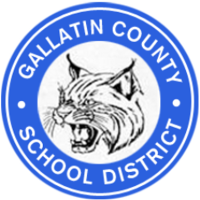 Seal of Gallatin County School District featuring a snarling wildcat in the center and a blue circular border with white text.