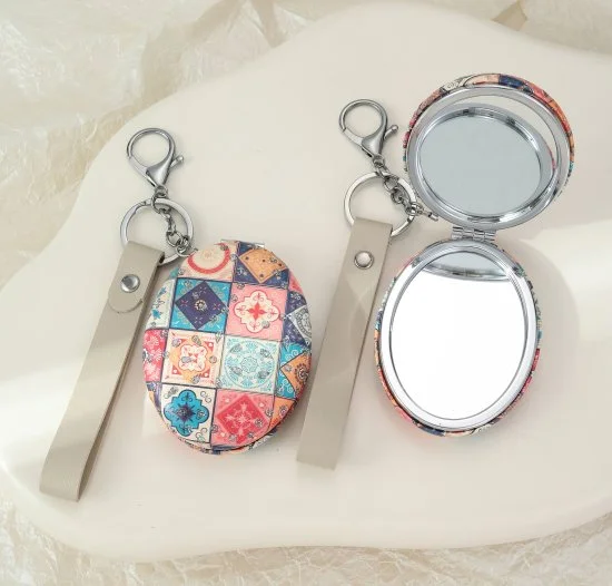 D20011V - Oval Compact Mirror Keyring.jpg