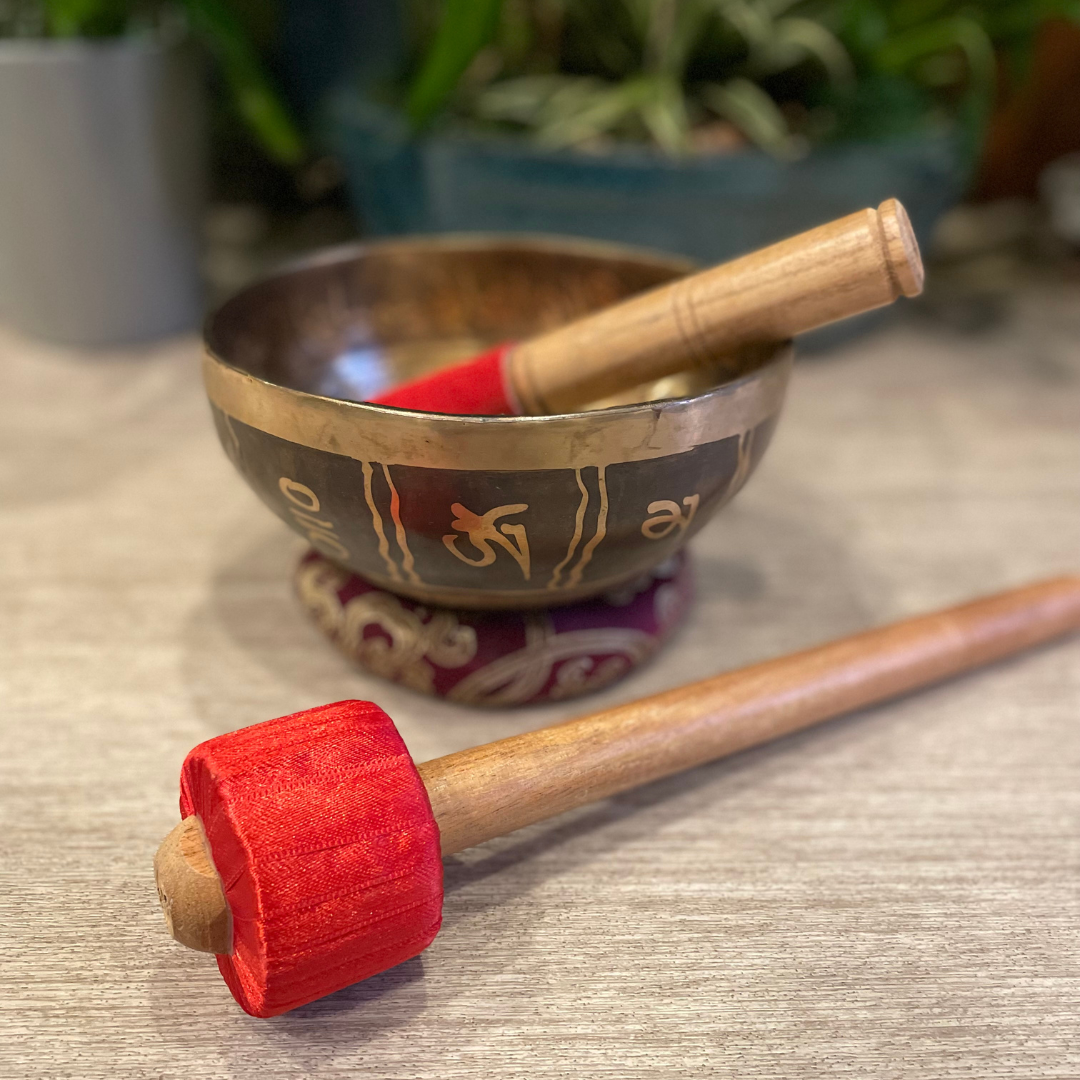 Tibetan singing bowl and mallets