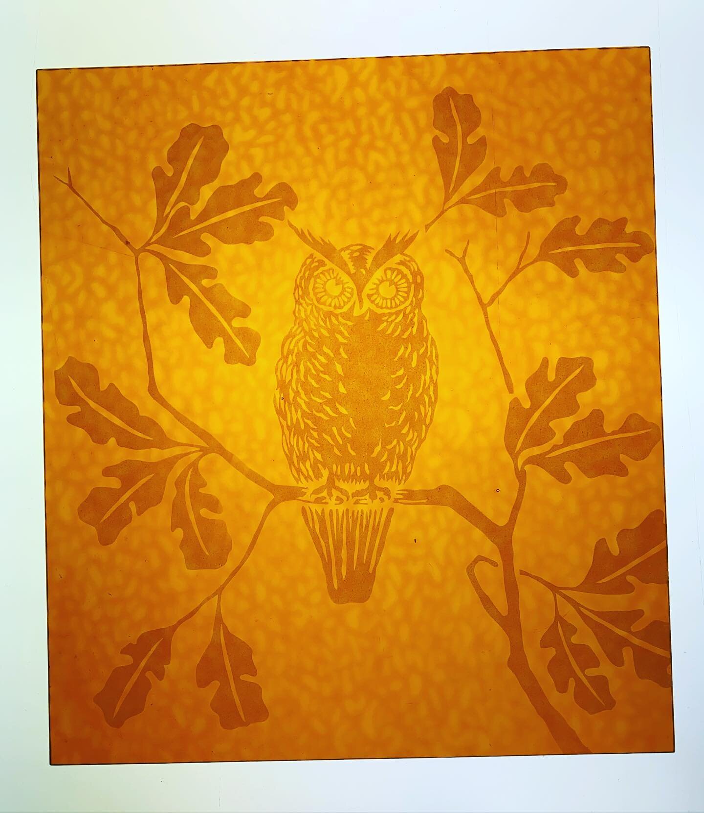 Replicated owl etching.