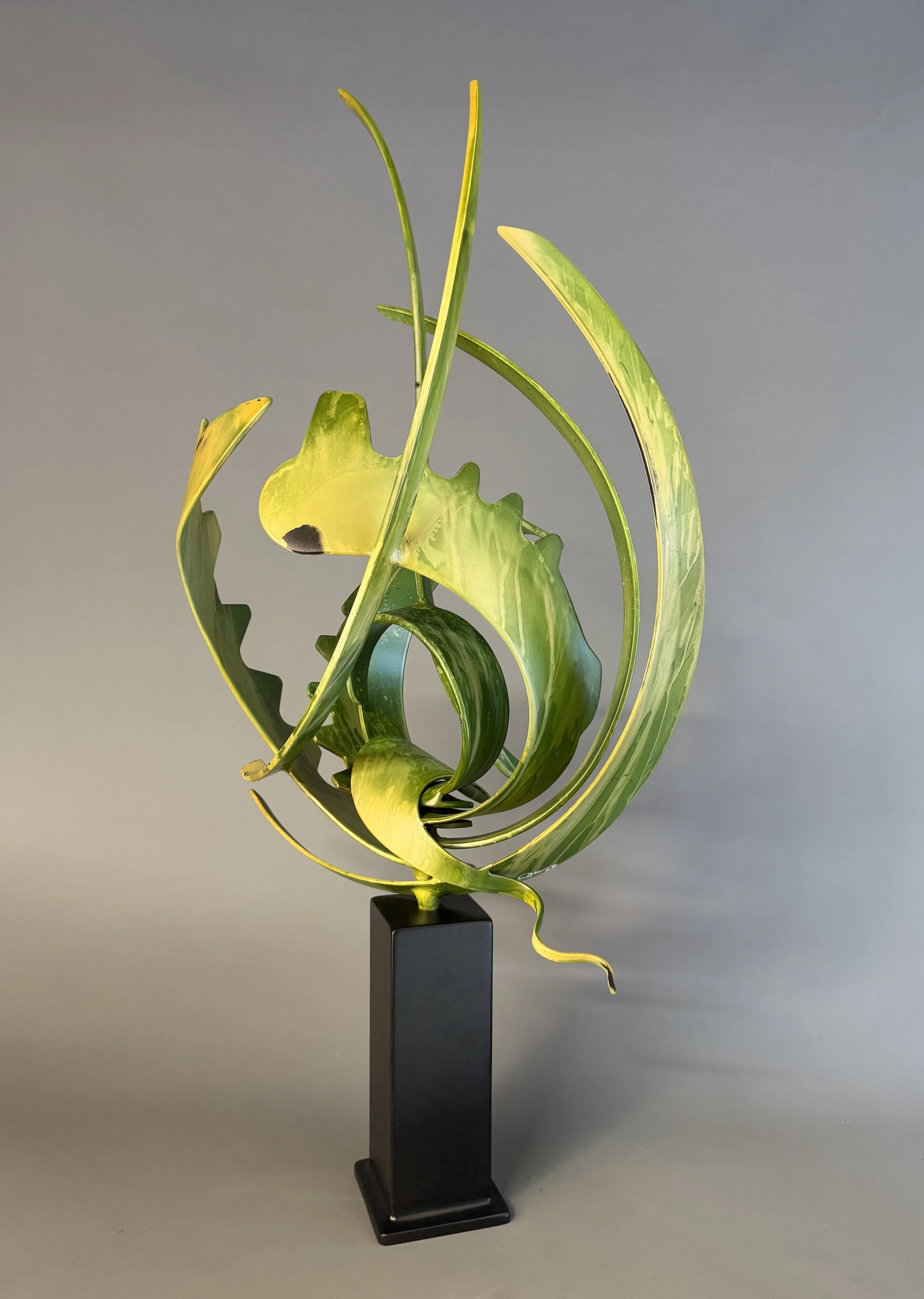 Storm Flower - W 17’’x H 35’’ x D 12’’ - 
Welded, hand formed aluminum, aluminum base,  automotive paint washes, matte automotive clear coat - $4,800