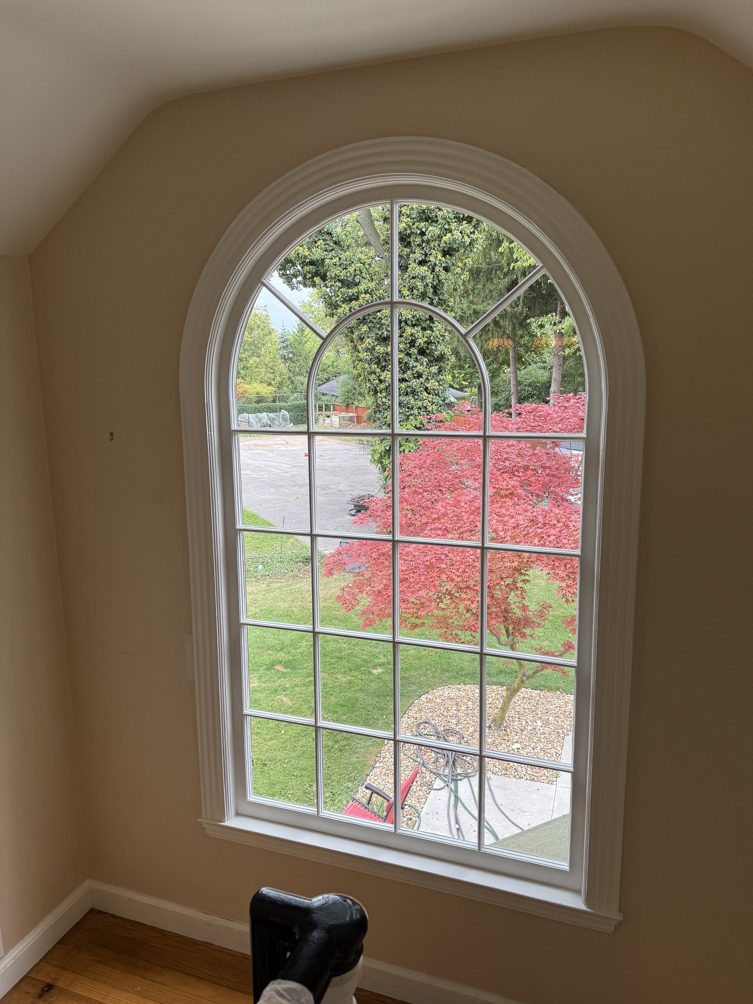 c. 1930s era multi-pane arched fixed sash. Full restoration - Bay City, Michigan