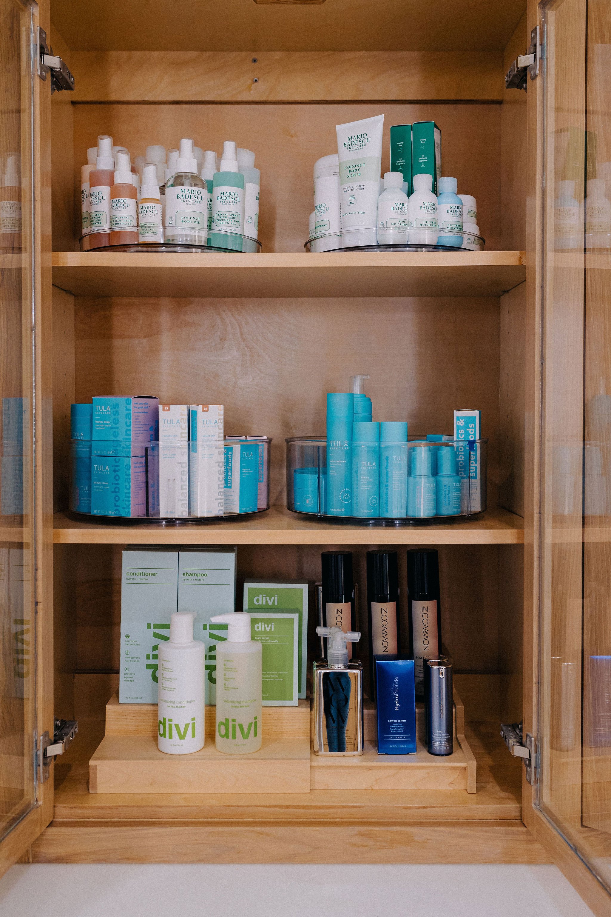 Bathroom cabinet organized during a renovation move by a concierge relocation service with custom storage systems