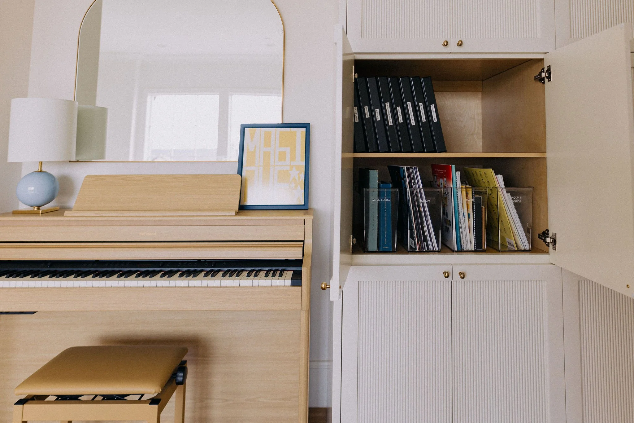 Luxury home office and cabinet organization completed by a concierge relocation service, with books and personal items fully unpacked and styled for immediate living