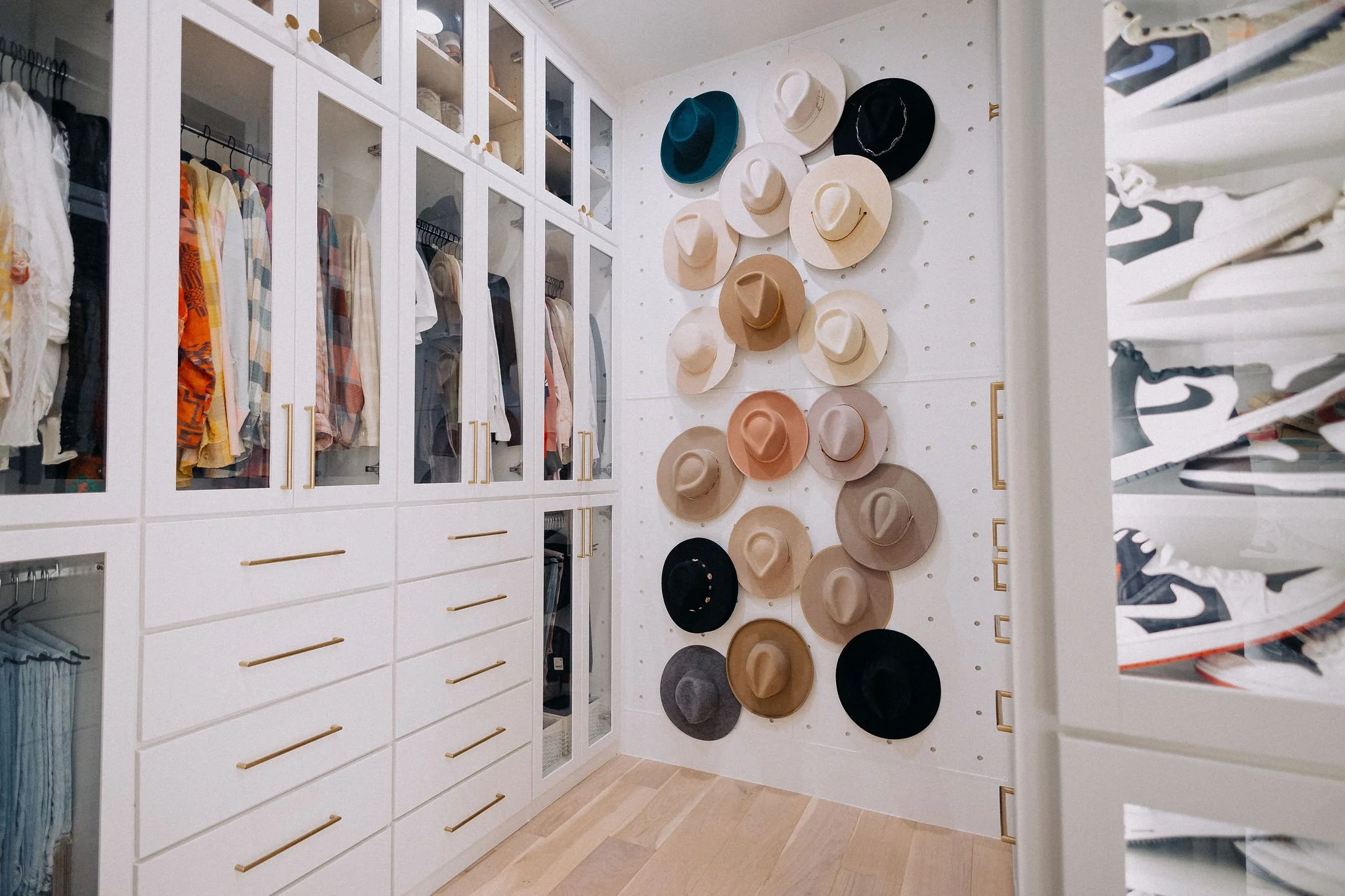 Custom primary closet organization designed by professional home organizers for long-term use