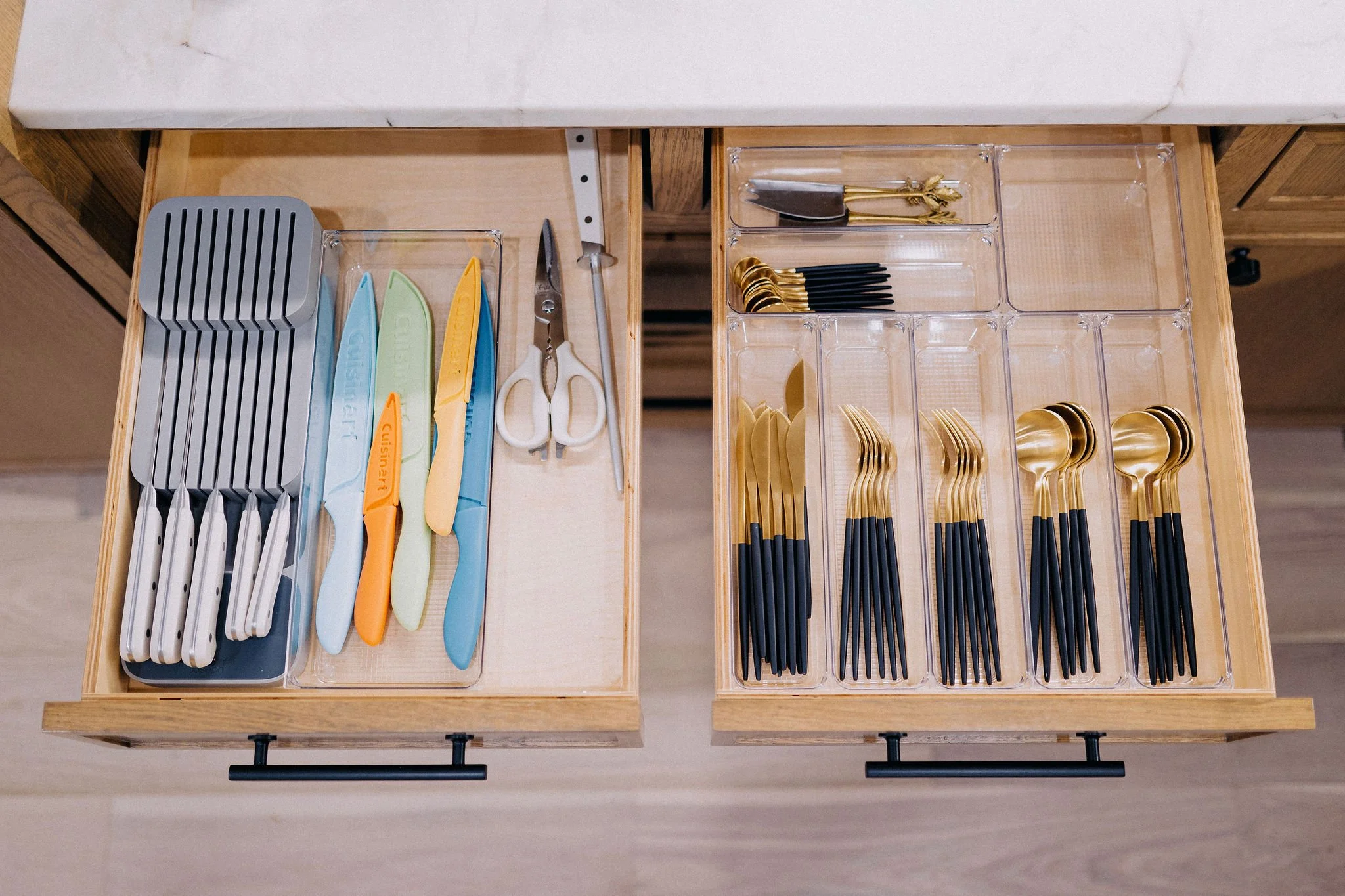 Kitchen drawer organized with precision by a professional concierge moving service for a move-in ready home
