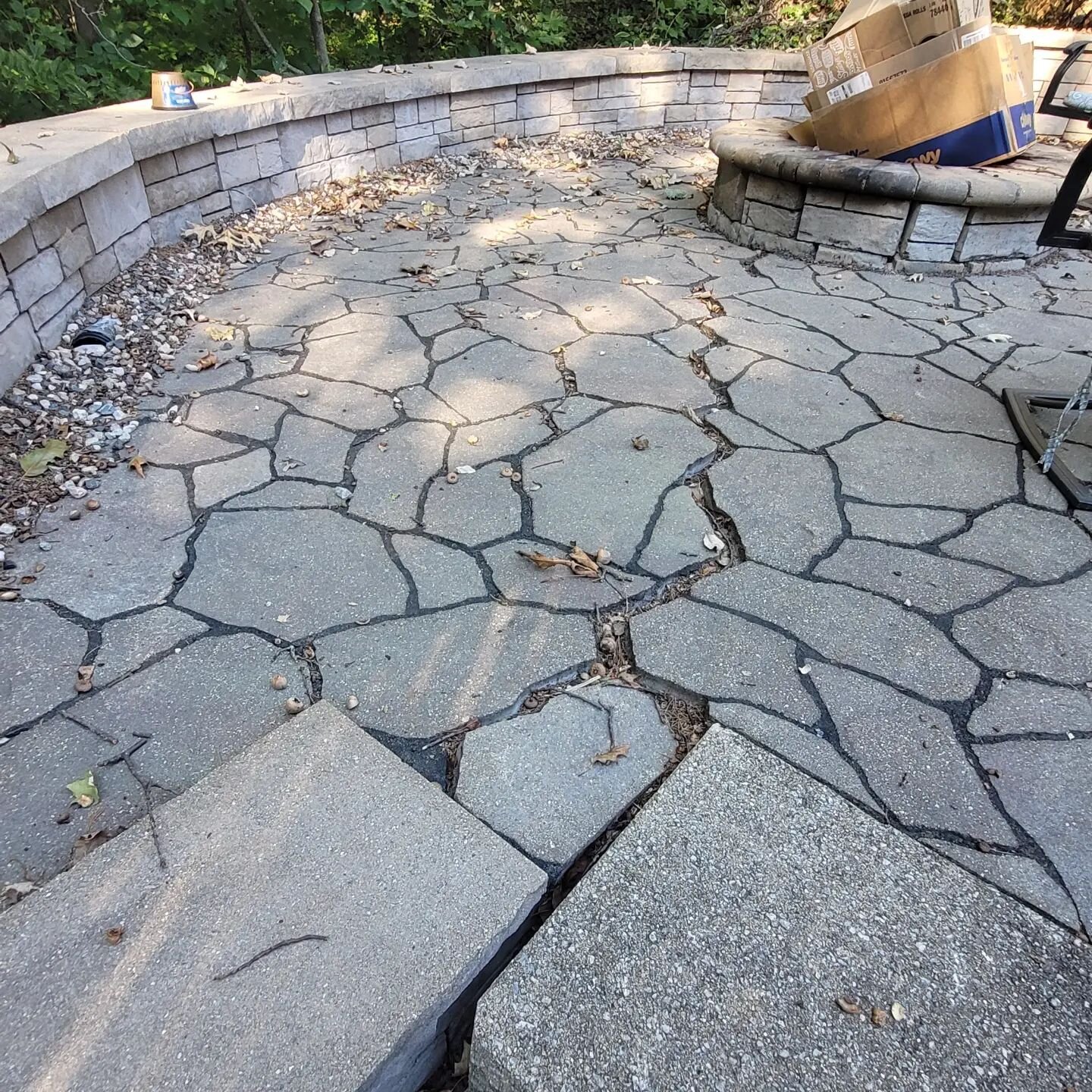 Fixing another landscape companies wall failure.  Full tear out of 6 foot tall retaining wall and patio that is sinking.  I can't stress enough how the most important thing about a retaining wall and patio is the base and drainage. If your foundation