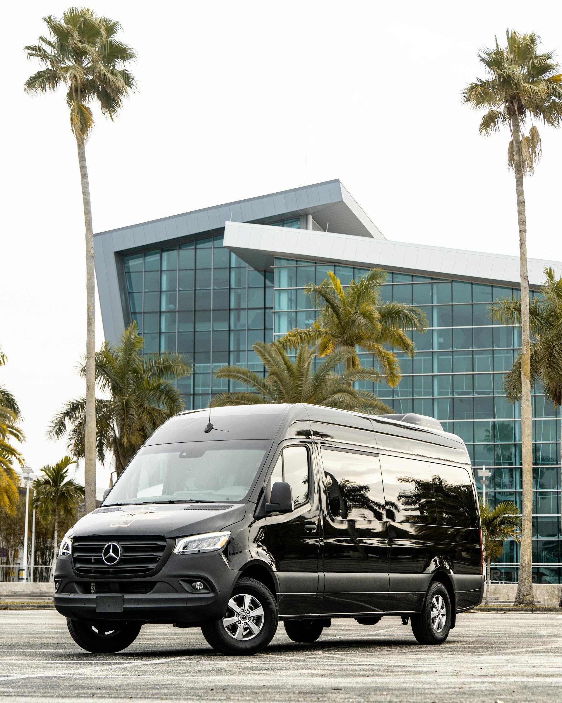 A mercedes sprinter sits in a parking lot, the engine blew out and it is waiting to be serviced. issues with the van were found using a mercedes sprinter scan tool