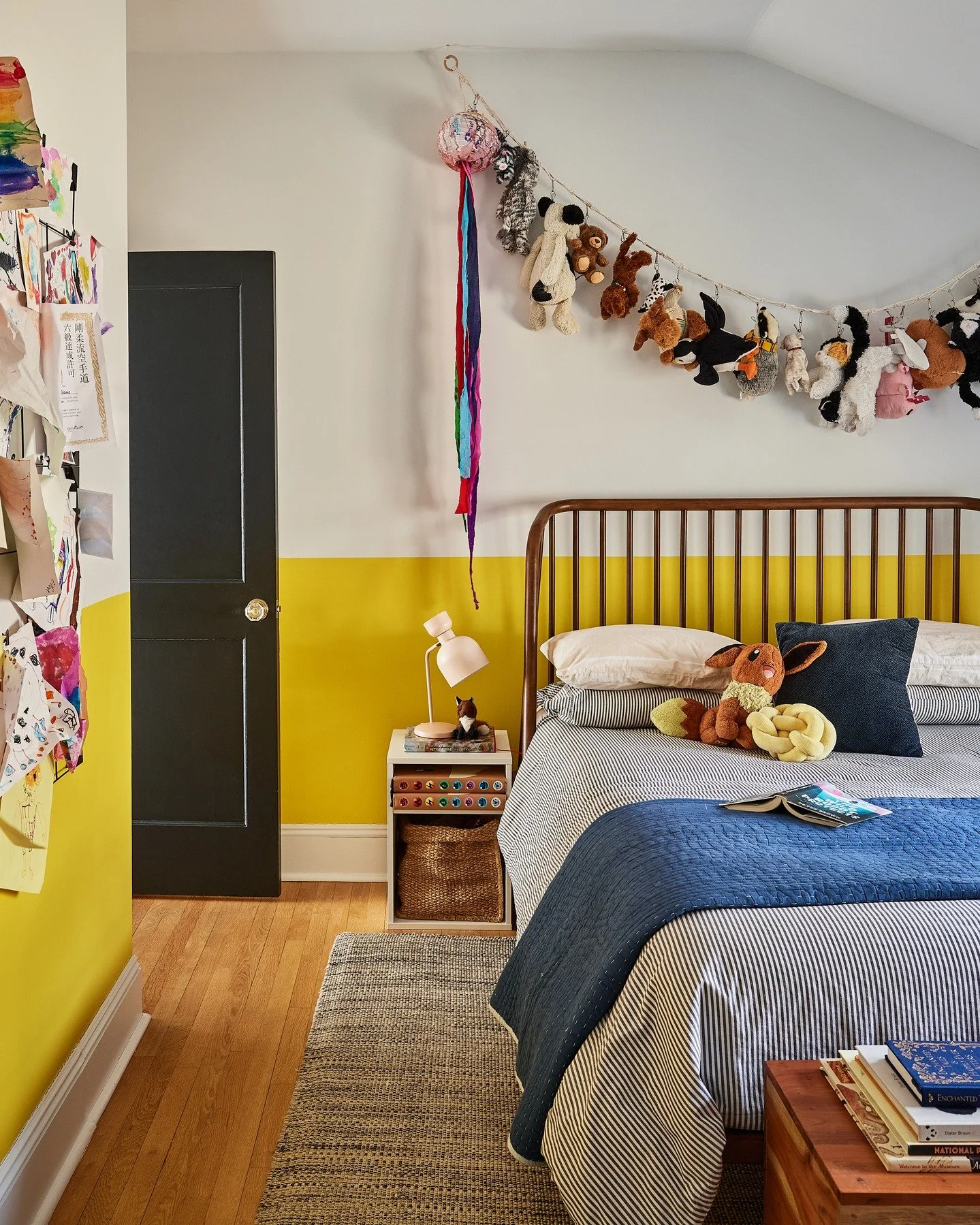 Elliot's was the first of the big kid bedrooms that we photographed. My plan was to go in, get one shot of the nicely made bed, and move on. Unlike baby Faye's room, Elliot's space was inhabited&nbsp;by a then seven-year-old&mdash;layered with years 