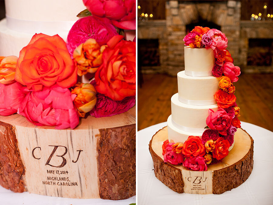 White-Wedding-Cake-with-Bright-Cascading-Flowers-on-Wood-Slice-Cake-Stand.jpeg