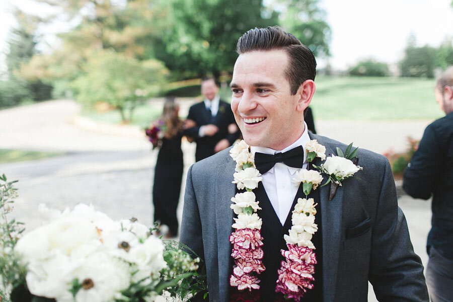 Groom-with-Floral-Garland_The-Schultzes-Photography.jpeg