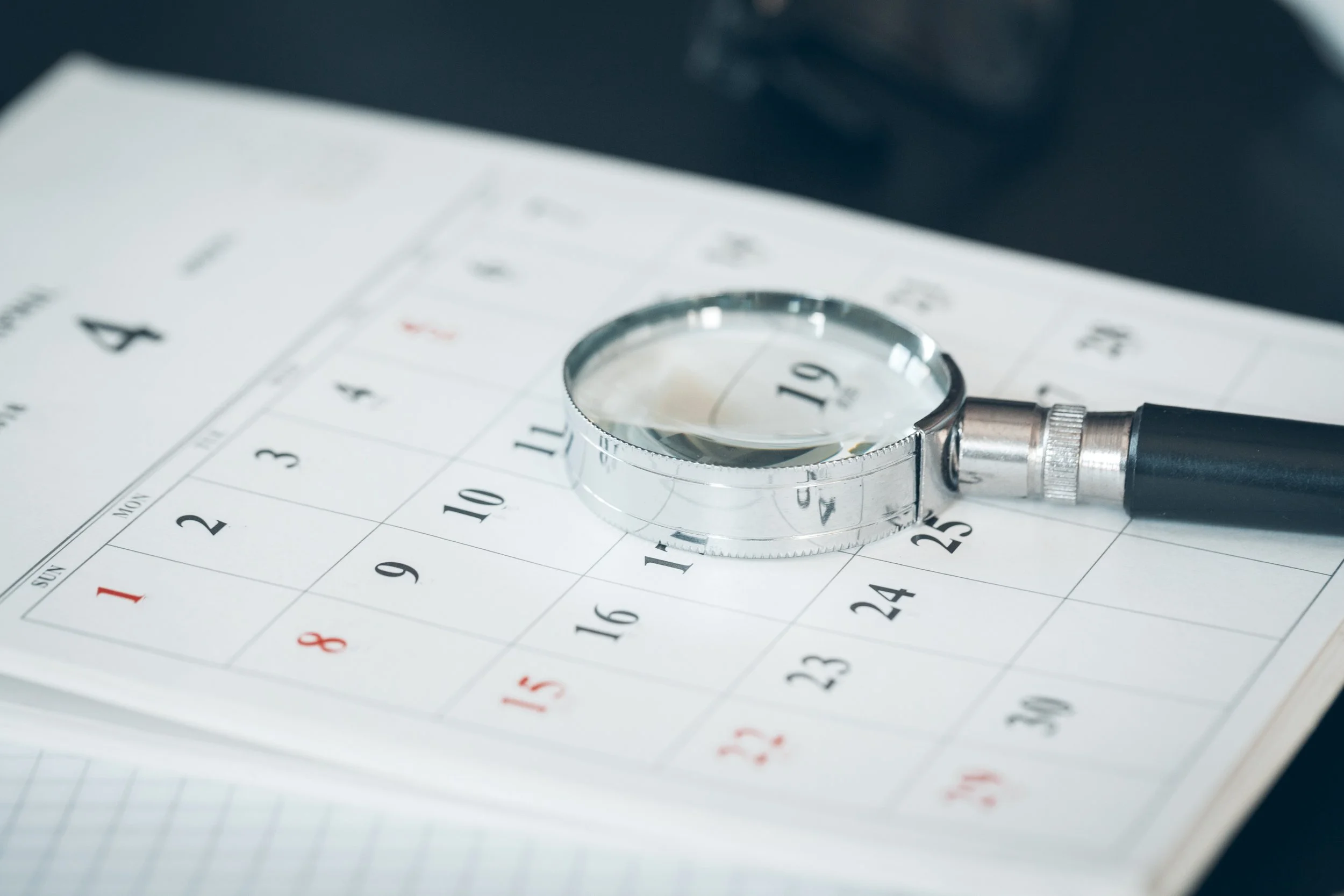 calendar-and-magnifying-glass-concept-image-of-bu-2022-01-28-11-29-08-utc.jpg