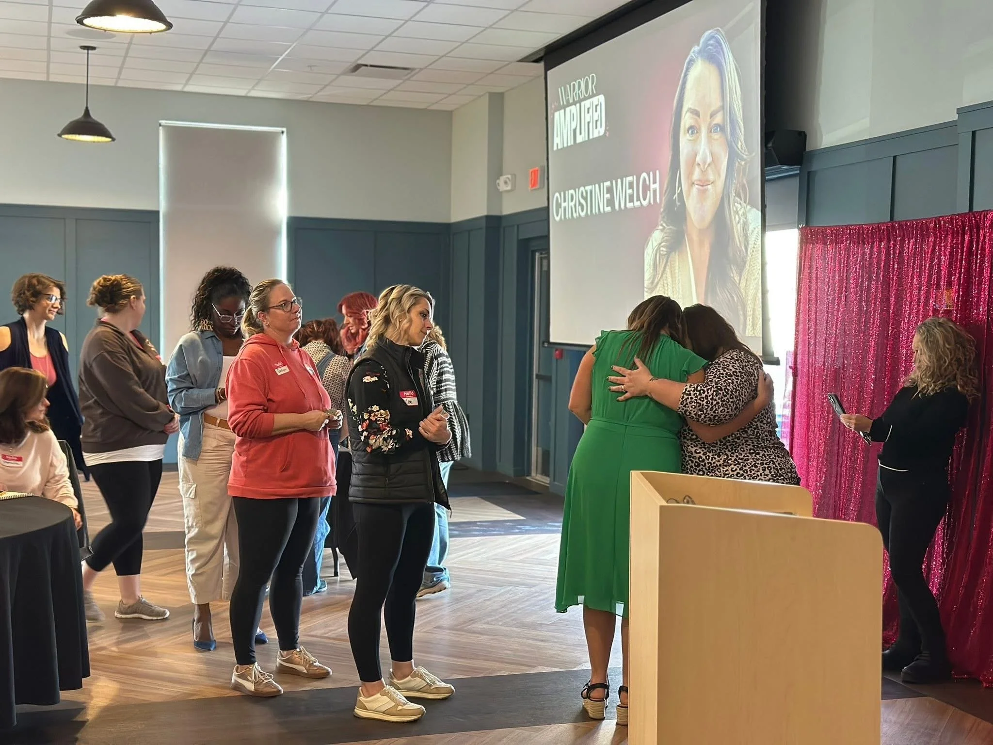 coach christine praying over women