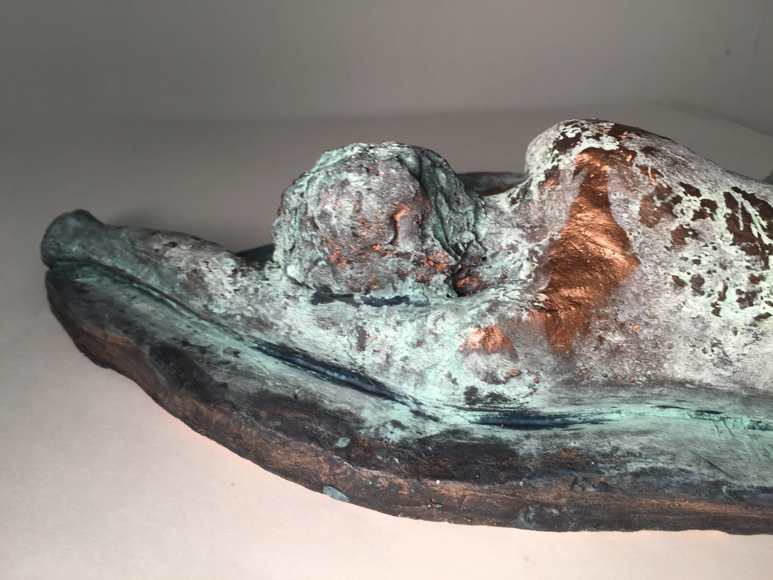 close up of reclined female- 20"