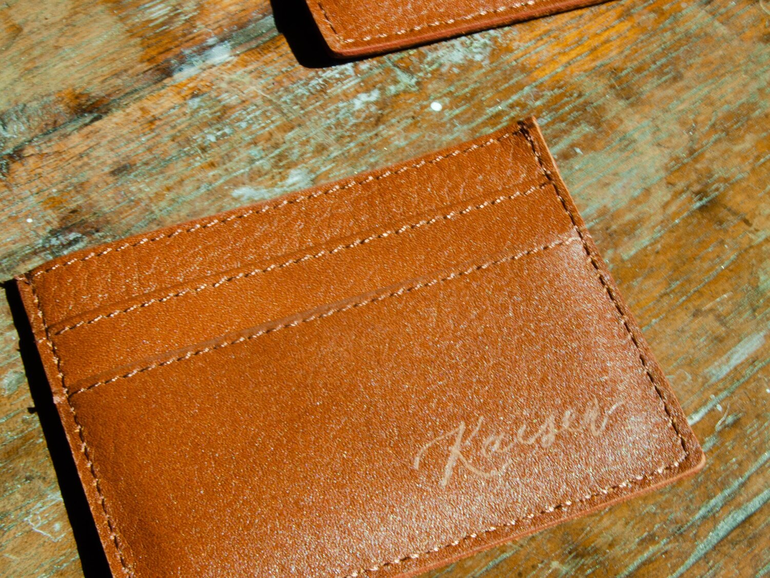 Hong Kong calligrapher customizing leather cardholder for luxury brand VIP gift