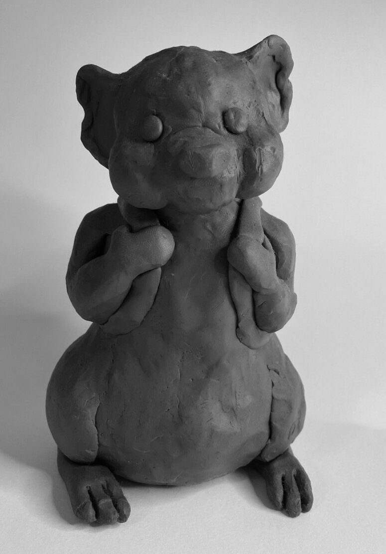 Clay pose 1 on white.jpg