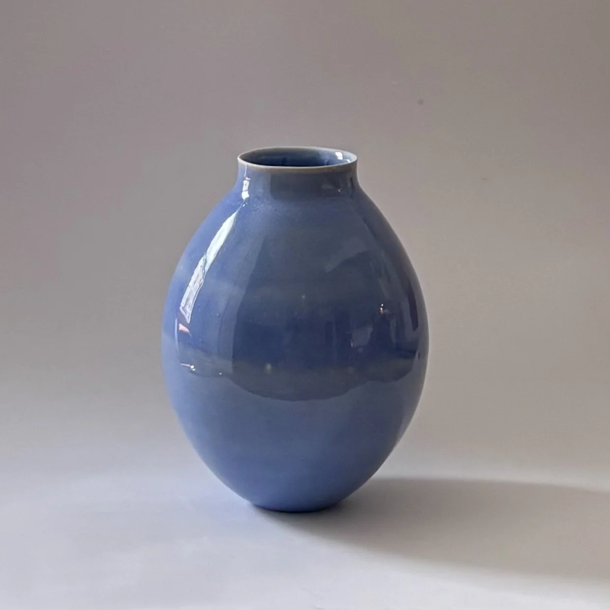glossy blue vase
