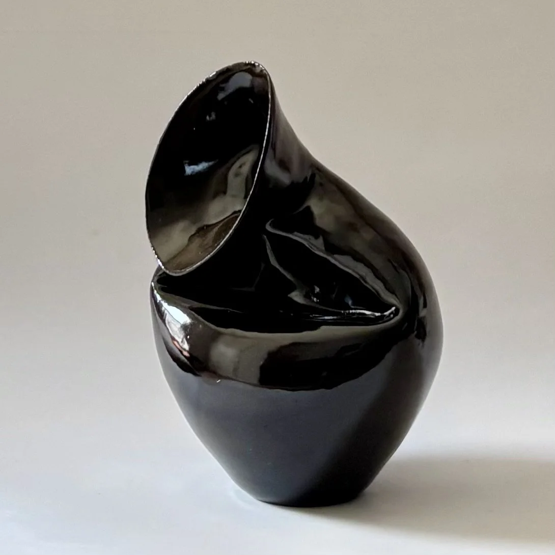 glossy amber warp vase
