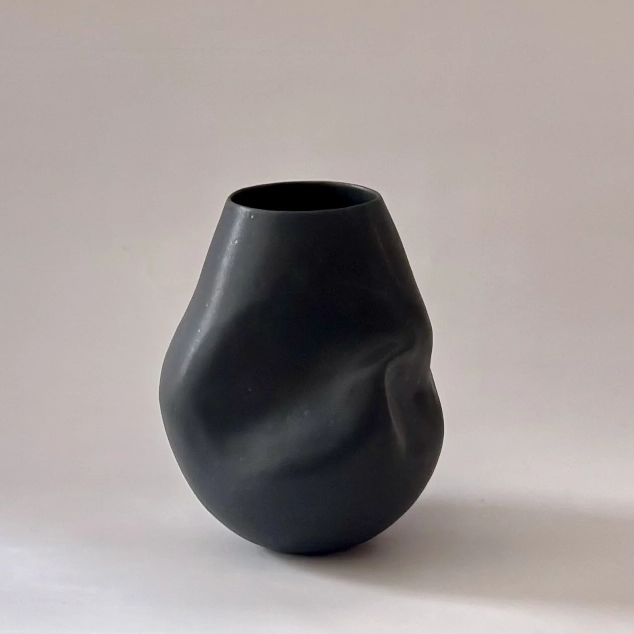 black warp vase