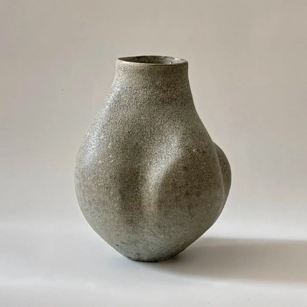 textured stone bulb vase